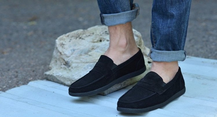 Black shoes on bare feet